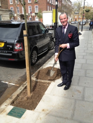 Lord Glenarthur plants the untimate Amelanchier tree in front of King Edward VII Hospital in Marylebone